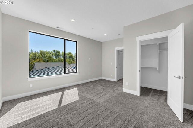 unfurnished bedroom featuring carpet