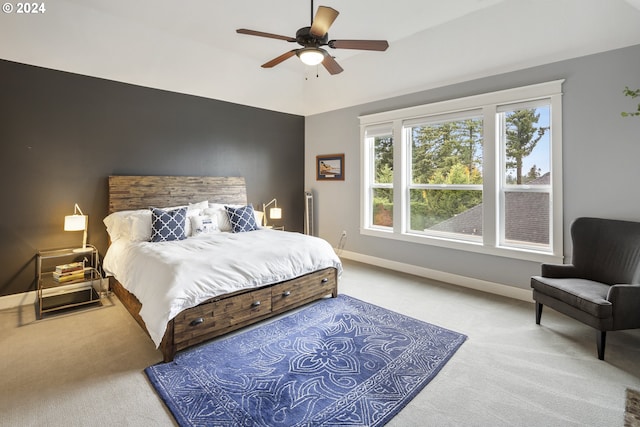 bedroom with ceiling fan and carpet floors