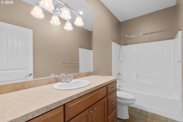 full bathroom featuring toilet, tile patterned flooring, shower / washtub combination, and vanity