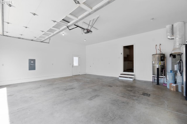 garage with a garage door opener, electric water heater, and electric panel