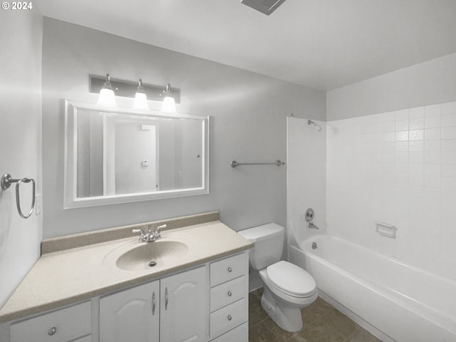 full bathroom featuring bathing tub / shower combination, vanity, toilet, and tile flooring