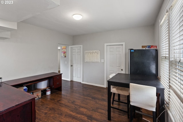 office with dark wood-type flooring