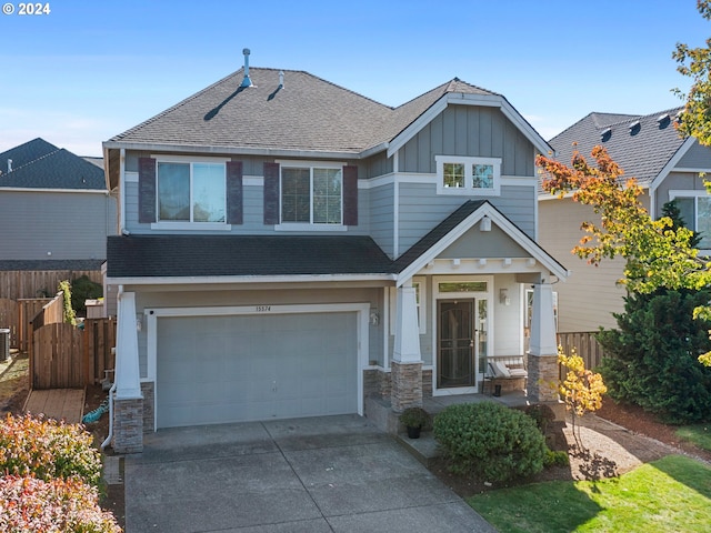 craftsman-style house featuring a garage