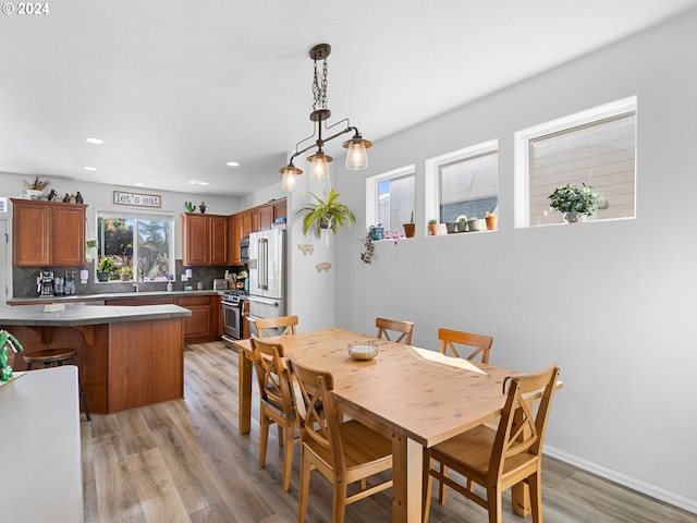 dining area featuring light hardwood / wood-style flooring