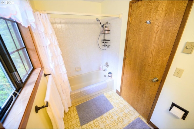 68191 E Twinberry Loop, Welches, OR 97067 - bathroom with shower / bathtub combination with curtain and tile patterned floors
