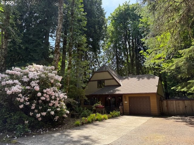 68191 E Twinberry Loop, Welches, OR 97067 - view of front of home with a garage and driveway