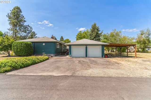 exterior space with a carport