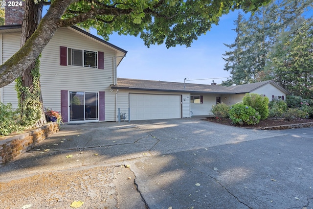 front facade with a garage