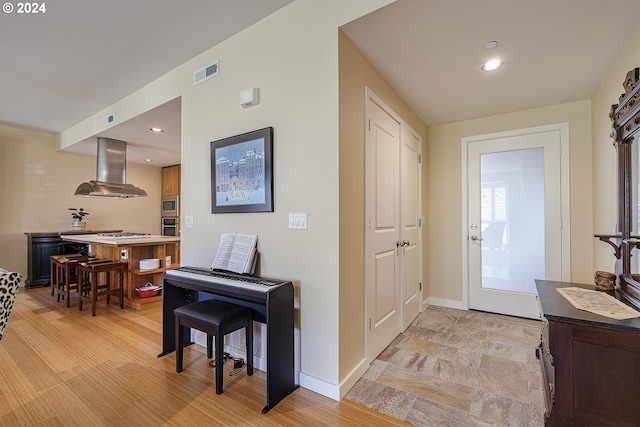 entryway with light wood-type flooring