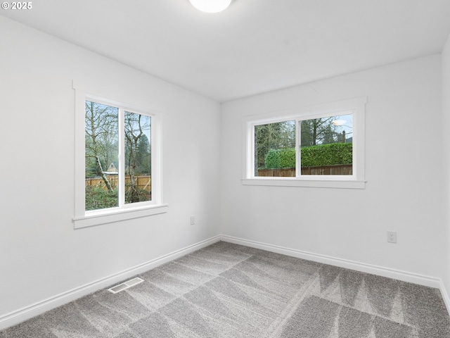 view of carpeted spare room