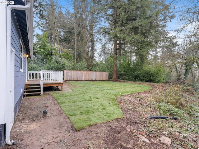 view of yard with a deck