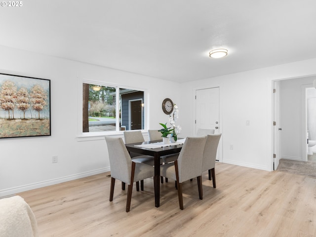 dining room featuring light hardwood / wood-style flooring