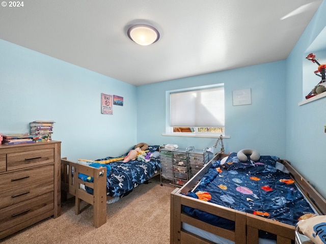 bedroom with light colored carpet