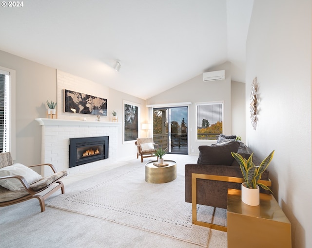 carpeted living room featuring a wall mounted AC, lofted ceiling, and a fireplace