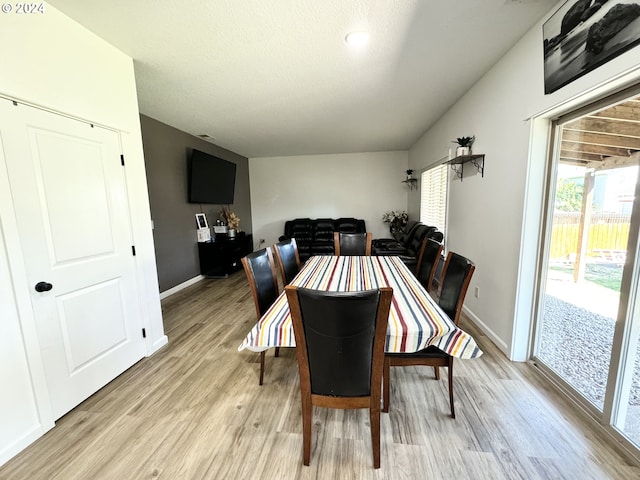 dining room featuring light wood-type flooring