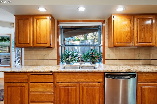 6864 SW Alden St, Portland, OR 97223 - kitchen featuring stainless steel dishwasher, a sink, light stone countertops, healthy amount of natural light, and recessed lighting