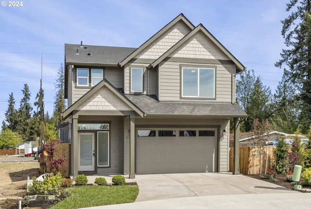 craftsman inspired home with a garage