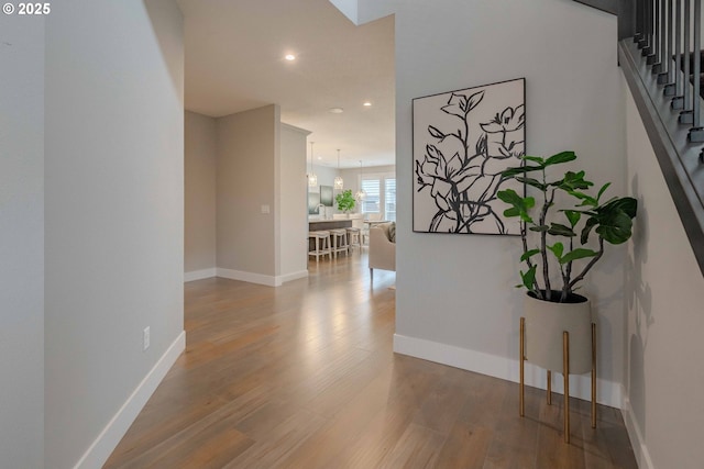 corridor featuring hardwood / wood-style flooring