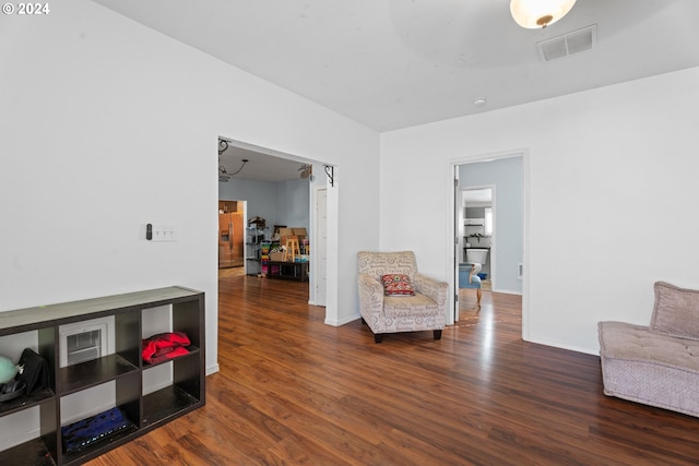 sitting room featuring wood-type flooring