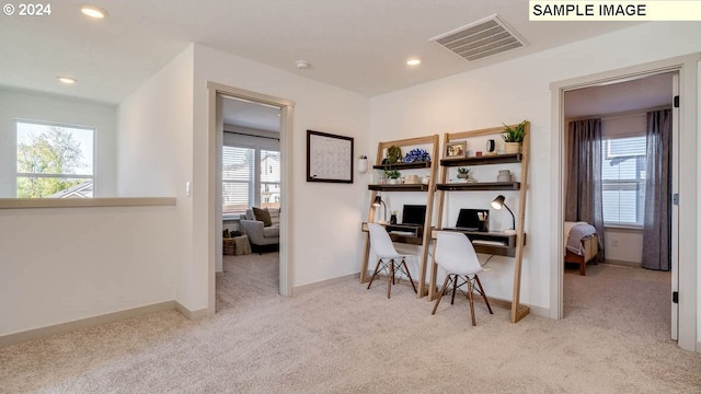 carpeted office with baseboards, plenty of natural light, visible vents, and recessed lighting