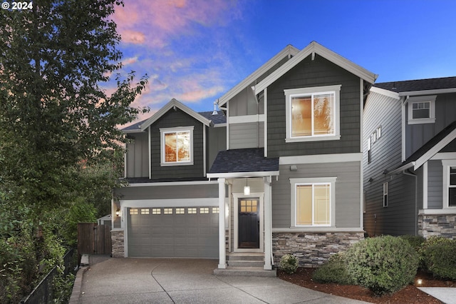 craftsman house featuring a garage