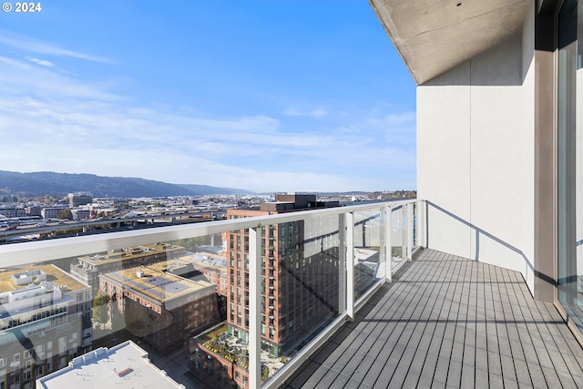 balcony featuring a mountain view