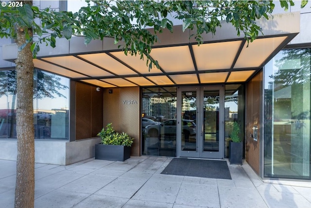 property entrance with french doors and a patio area