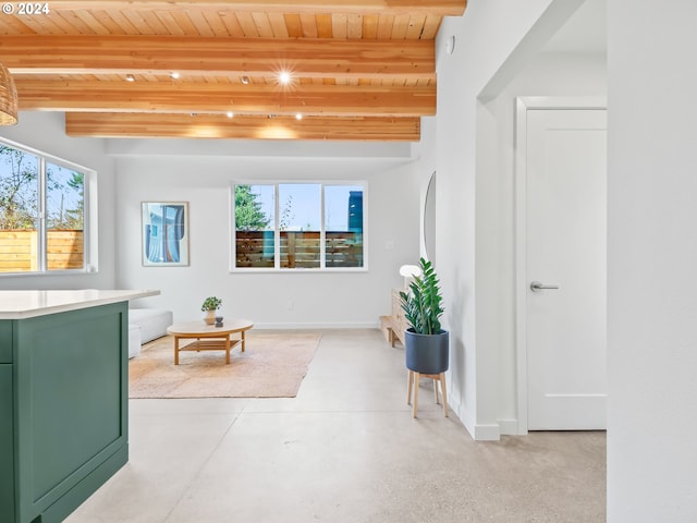 interior space featuring beamed ceiling and wood ceiling