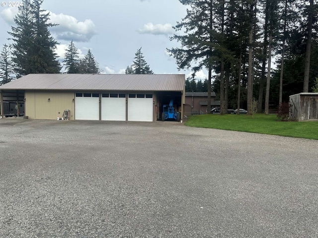 garage with a lawn