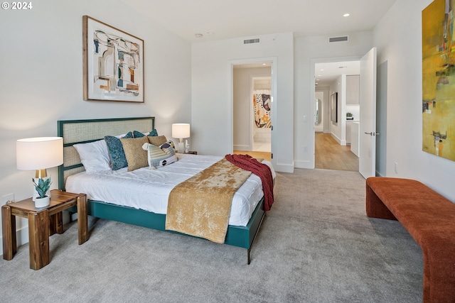 bedroom featuring carpet, visible vents, baseboards, and recessed lighting