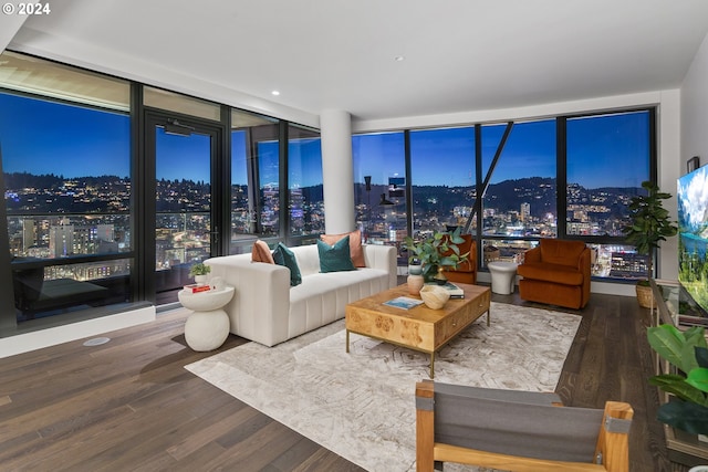 sunroom featuring a city view