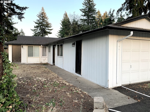 exterior space featuring a garage