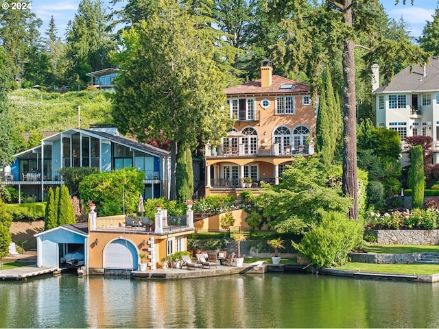 exterior space with a water view