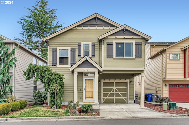 craftsman house featuring a garage