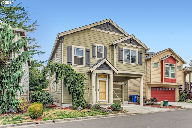 view of front of property with a garage