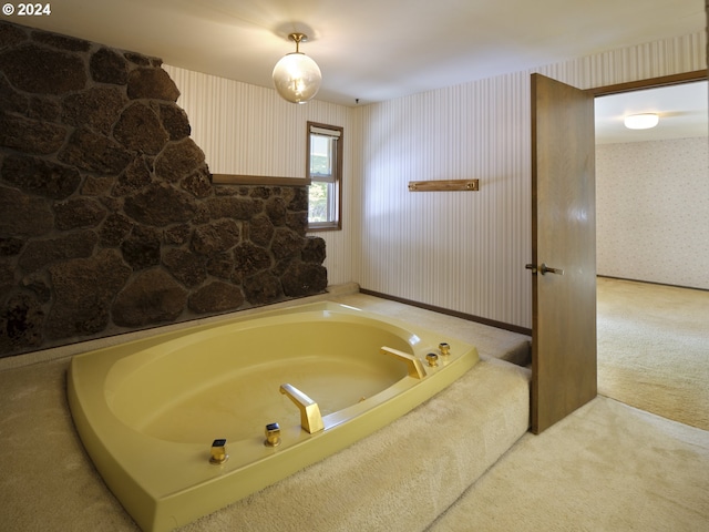 bathroom featuring a washtub