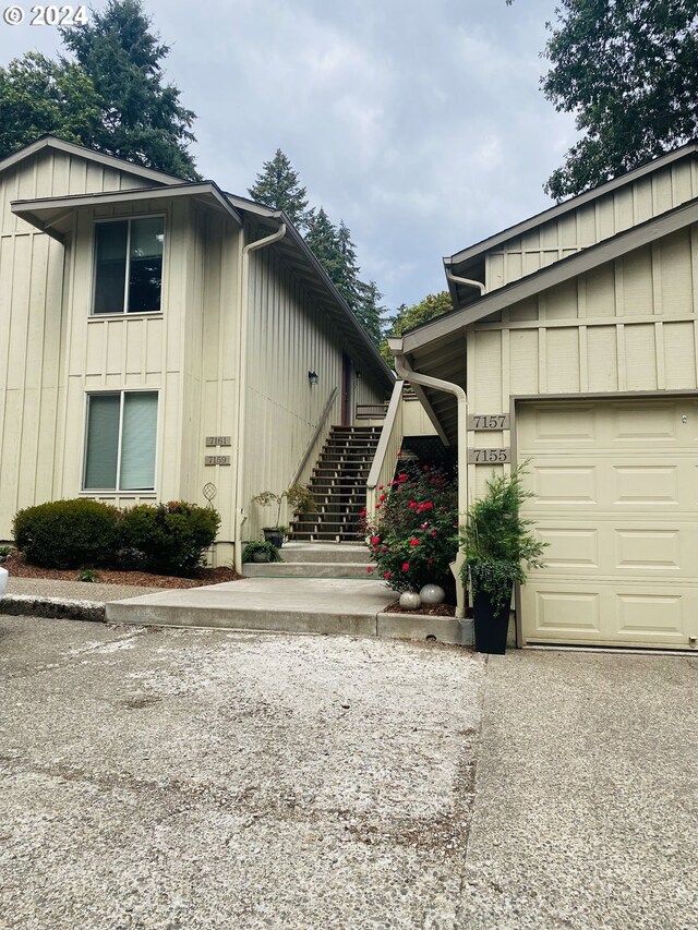 view of property exterior featuring a garage