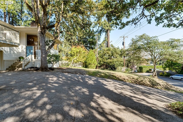 view of side of home featuring brick siding