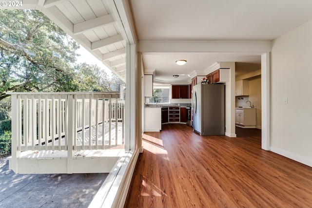 wooden deck featuring a sink