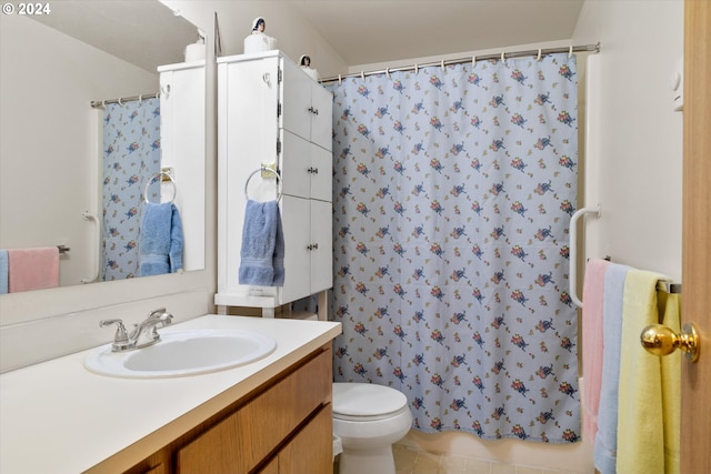 bathroom featuring tile patterned floors, a shower with curtain, vanity, and toilet