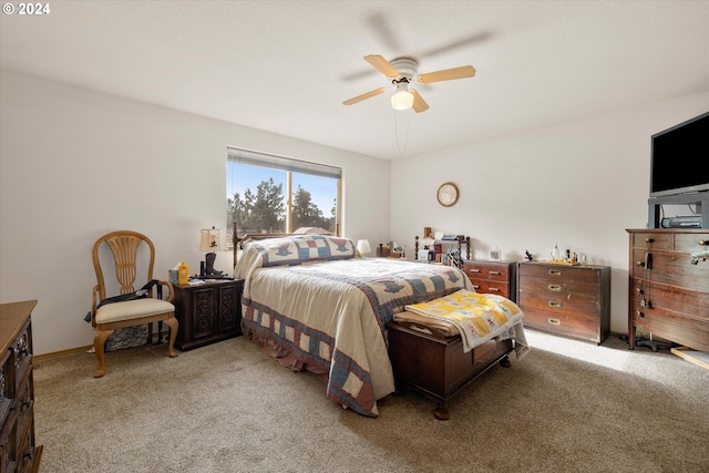 bedroom with light colored carpet and ceiling fan