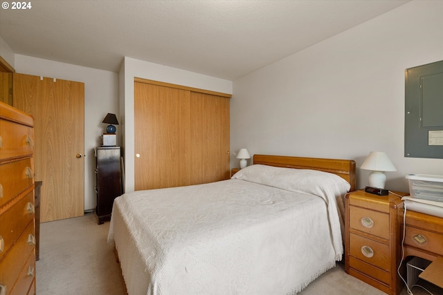 carpeted bedroom with a closet