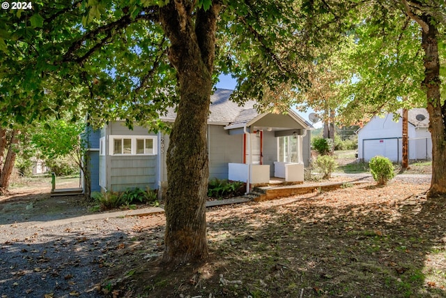 obstructed view of property featuring a garage