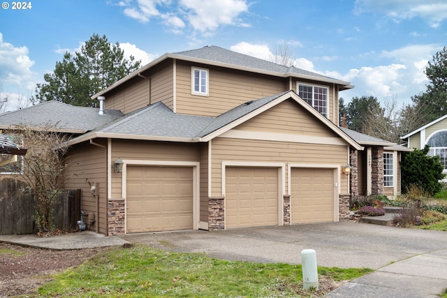 view of front of property with a garage