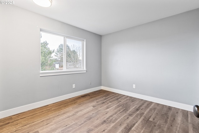 empty room featuring hardwood / wood-style floors