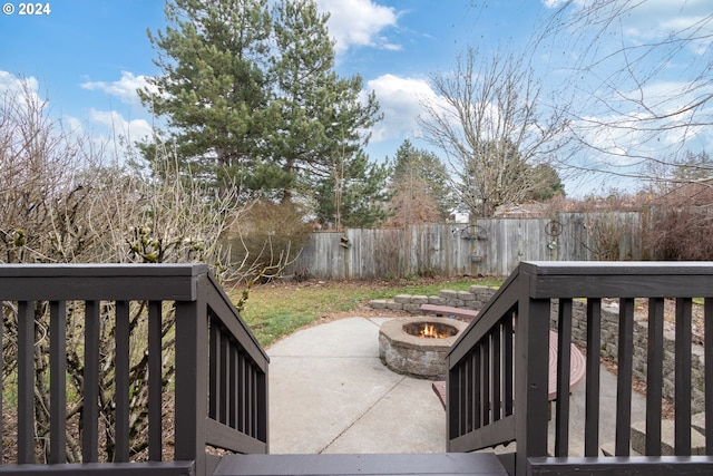 exterior space with a fire pit