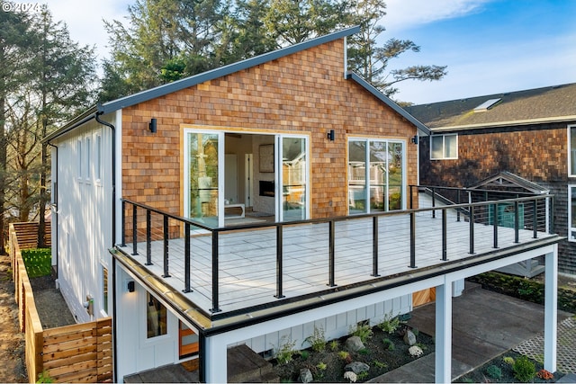 back of house with a balcony