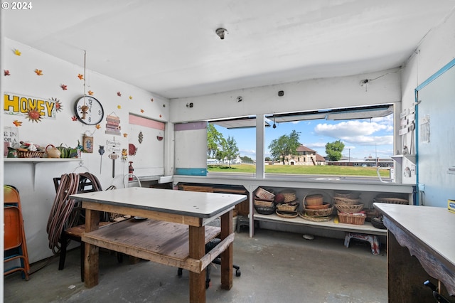 dining room with concrete flooring