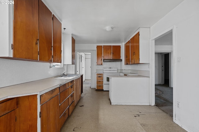 kitchen featuring sink and electric stove