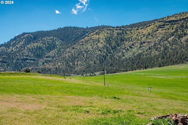 view of mountain feature featuring a rural view